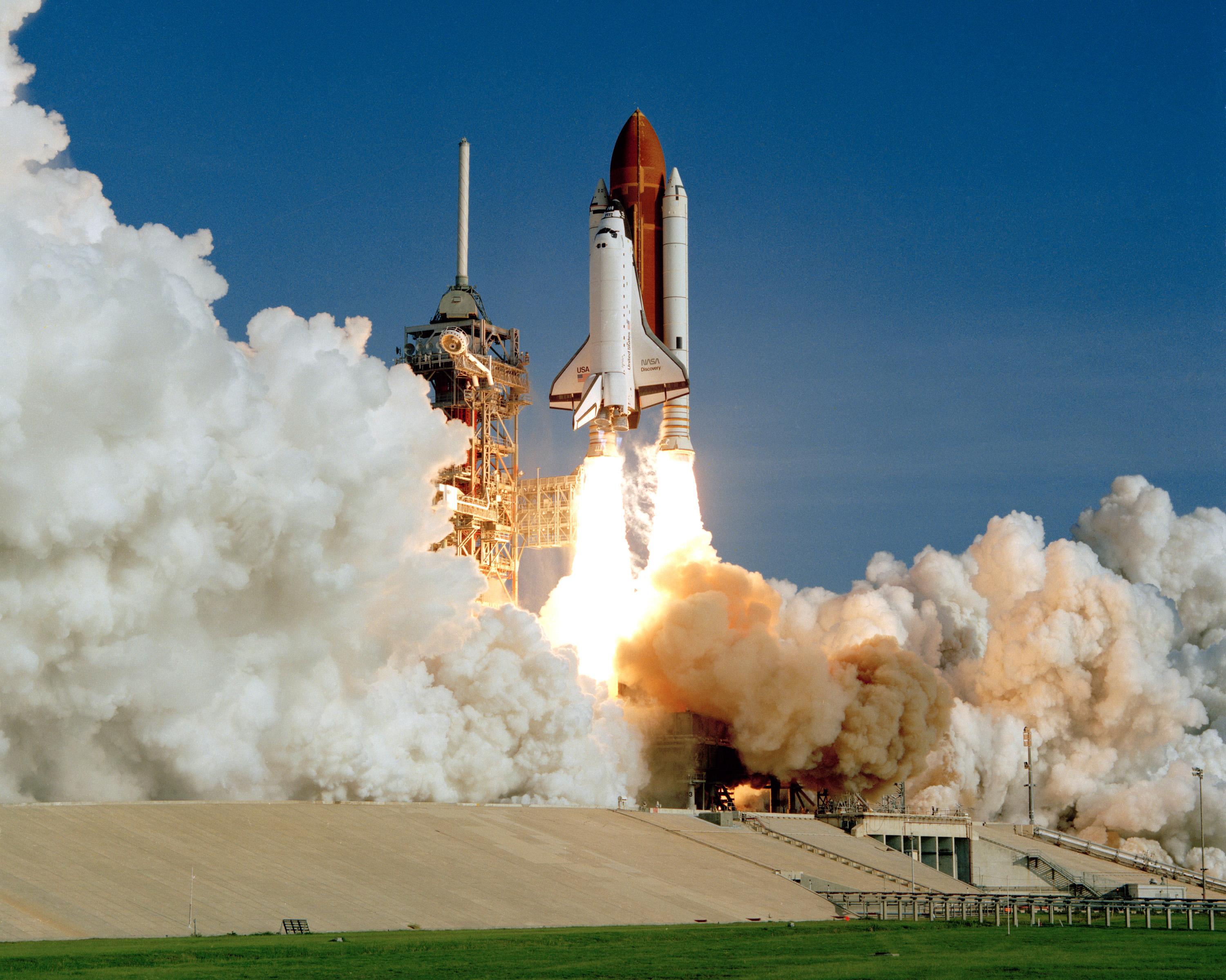 Space Shuttle Discovery lifting off